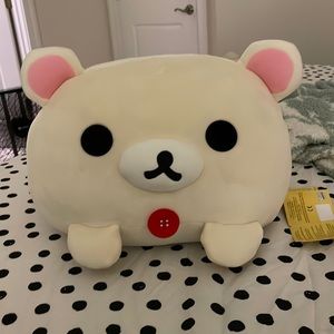 Cream Rilakkuma stuffed bear with red button